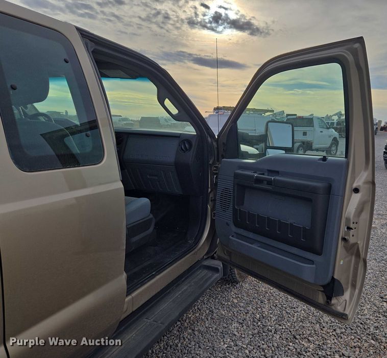 image for item ET1126 2012 Ford F350 Ext. Cab utility bed pickup truck