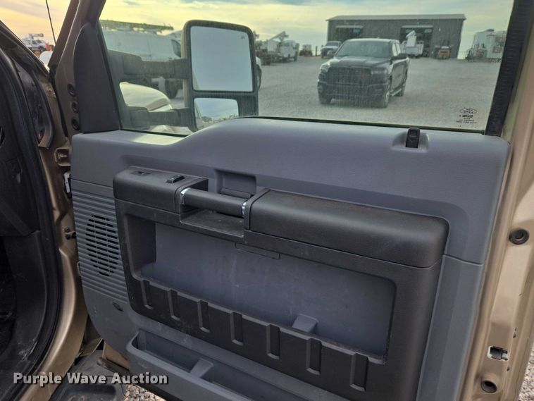 image for item ET1126 2012 Ford F350 Ext. Cab utility bed pickup truck