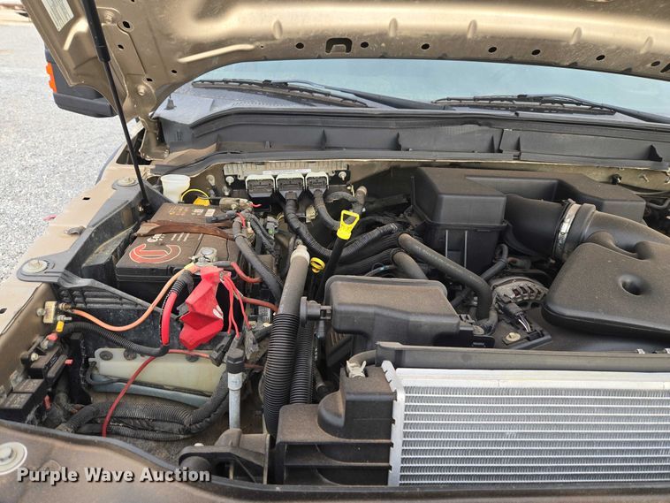 image for item ET1126 2012 Ford F350 Ext. Cab utility bed pickup truck