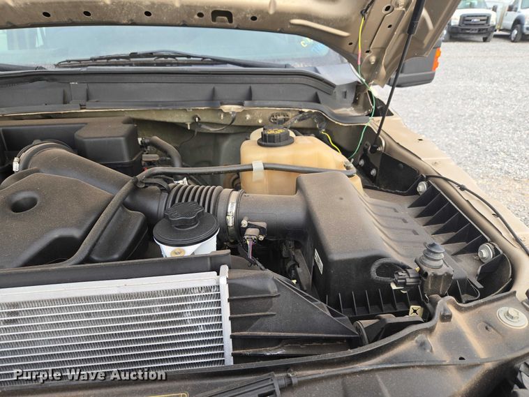 image for item ET1126 2012 Ford F350 Ext. Cab utility bed pickup truck