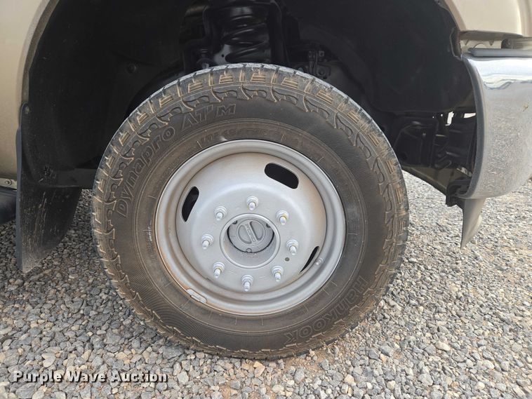 image for item ET1126 2012 Ford F350 Ext. Cab utility bed pickup truck