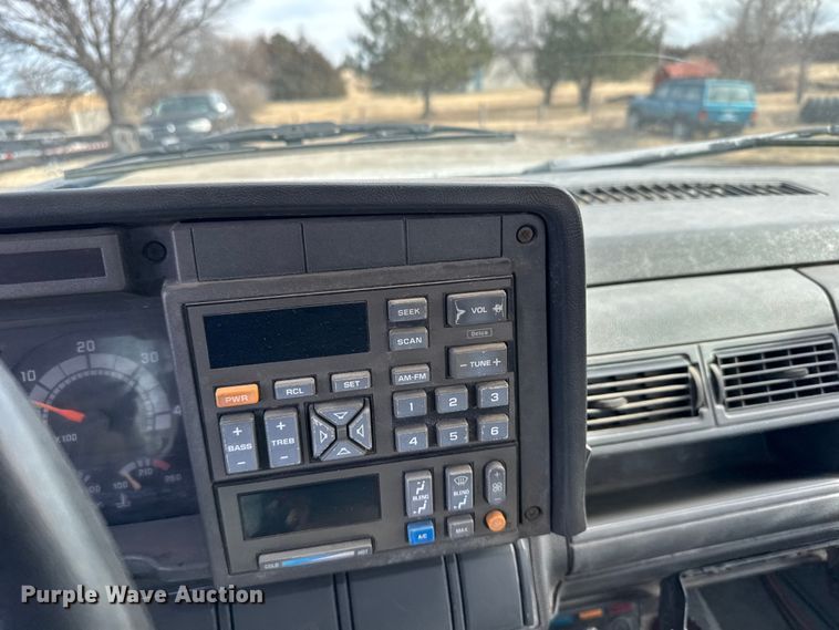 image for item FB0569 1996 GMC C6 tow truck