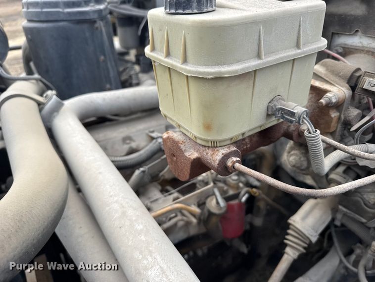 image for item FB0569 1996 GMC C6 tow truck