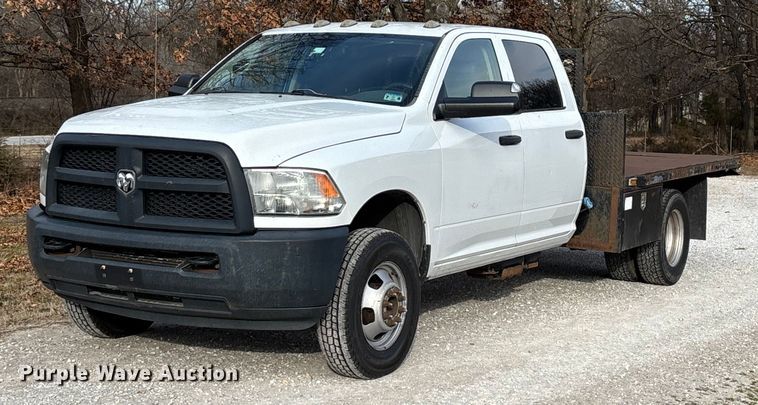 image for item FG0023 2013 RAM 3500 Crew Cab flatbed pickup truck