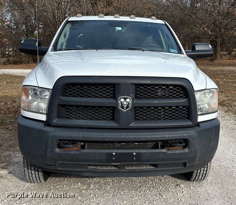 image for item FG0023 2013 RAM 3500 Crew Cab flatbed pickup truck