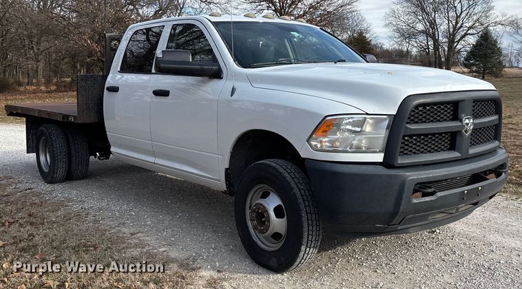 image for item FG0023 2013 RAM 3500 Crew Cab flatbed pickup truck