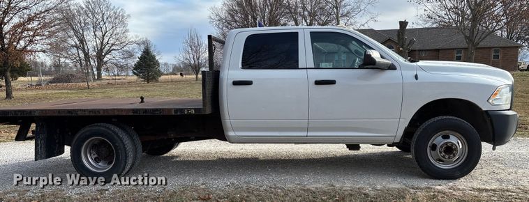 image for item FG0023 2013 RAM 3500 Crew Cab flatbed pickup truck