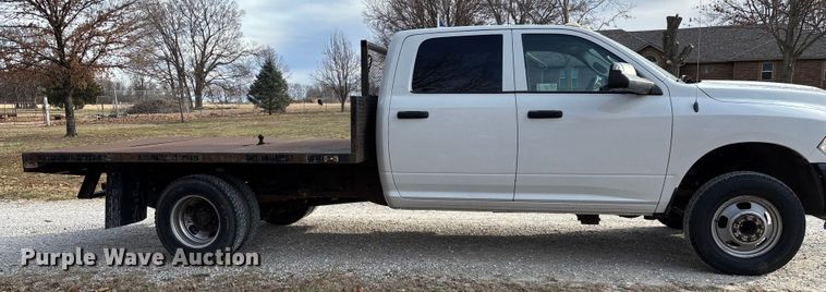 image for item FG0023 2013 RAM 3500 Crew Cab flatbed pickup truck