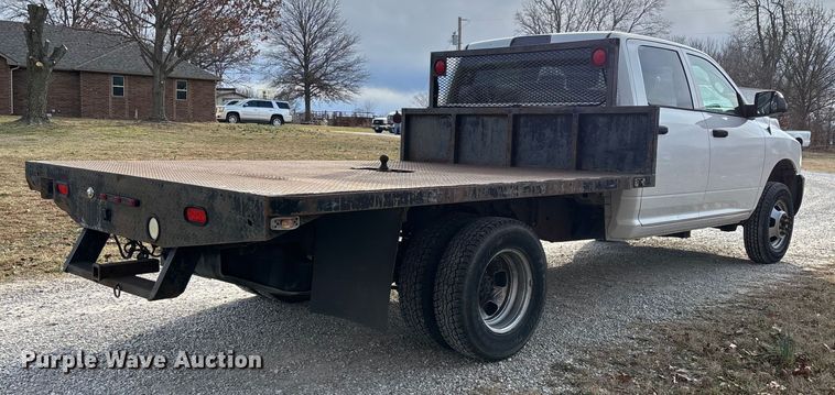 image for item FG0023 2013 RAM 3500 Crew Cab flatbed pickup truck