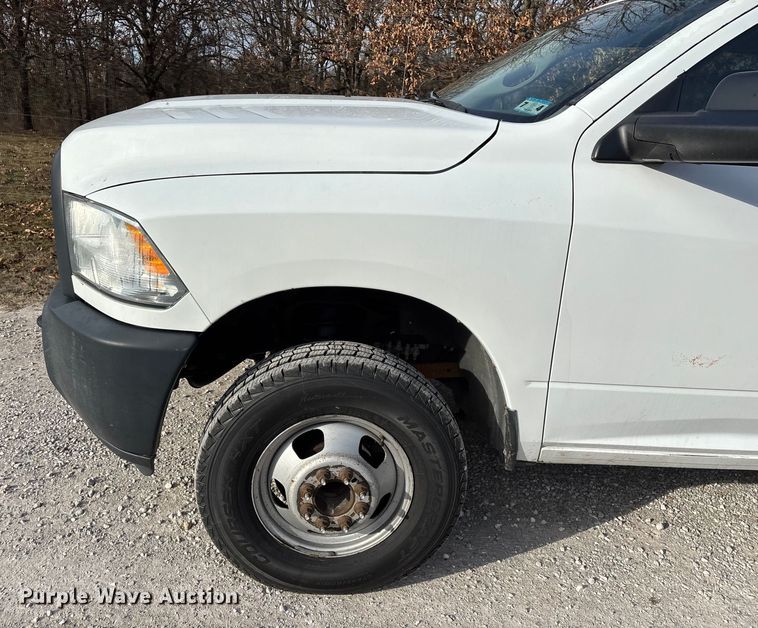 image for item FG0023 2013 RAM 3500 Crew Cab flatbed pickup truck