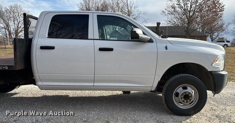 image for item FG0023 2013 RAM 3500 Crew Cab flatbed pickup truck