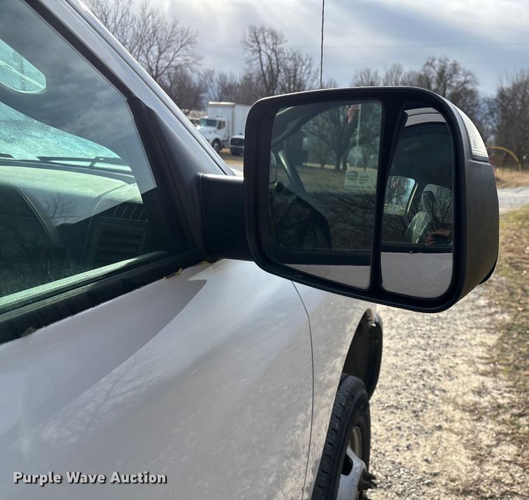 image for item FG0023 2013 RAM 3500 Crew Cab flatbed pickup truck