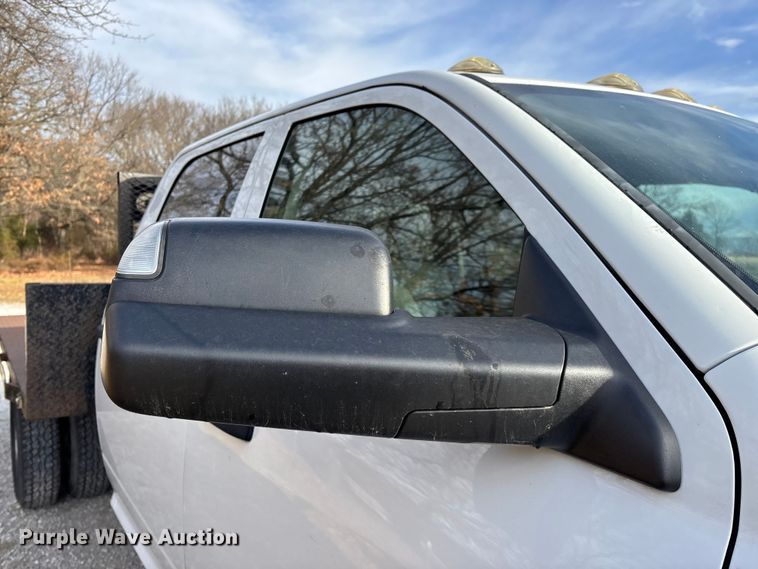 image for item FG0023 2013 RAM 3500 Crew Cab flatbed pickup truck