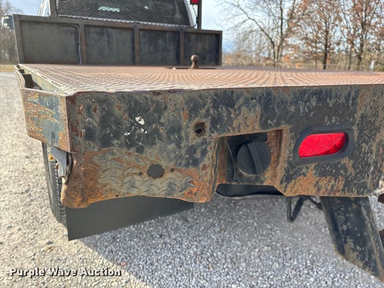 image for item FG0023 2013 RAM 3500 Crew Cab flatbed pickup truck