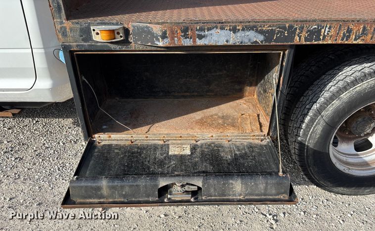 image for item FG0023 2013 RAM 3500 Crew Cab flatbed pickup truck