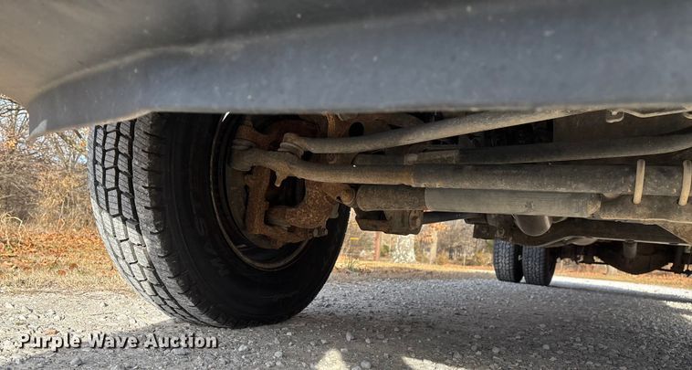 image for item FG0023 2013 RAM 3500 Crew Cab flatbed pickup truck