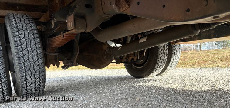 image for item FG0023 2013 RAM 3500 Crew Cab flatbed pickup truck