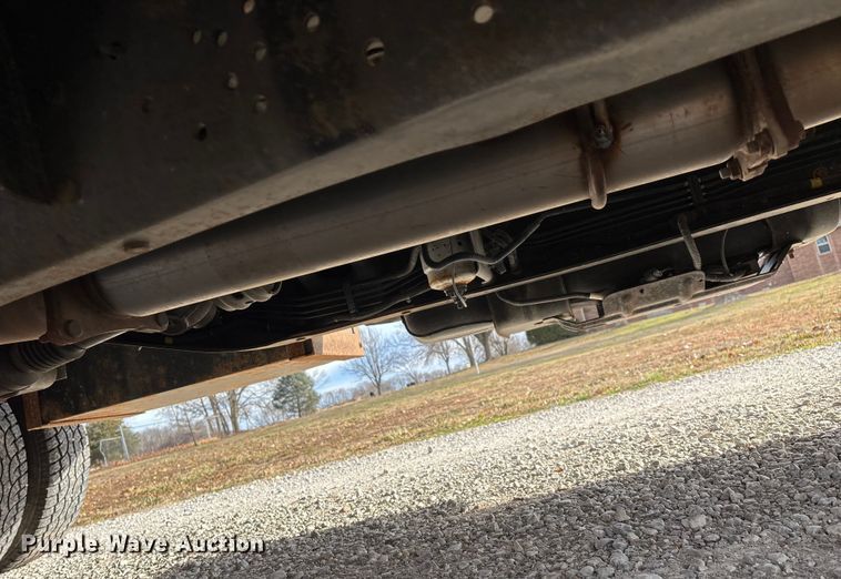 image for item FG0023 2013 RAM 3500 Crew Cab flatbed pickup truck