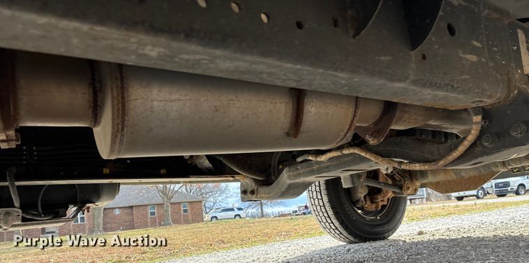 image for item FG0023 2013 RAM 3500 Crew Cab flatbed pickup truck