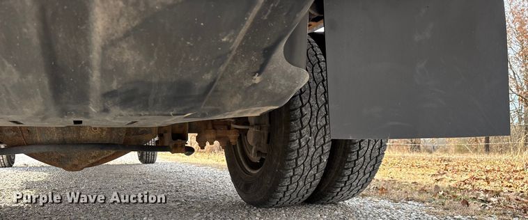 image for item FG0023 2013 RAM 3500 Crew Cab flatbed pickup truck