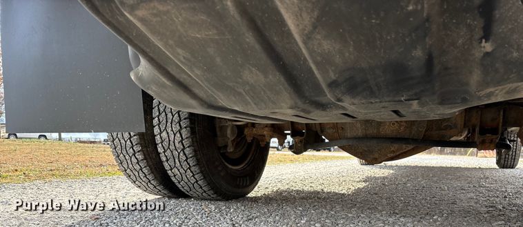 image for item FG0023 2013 RAM 3500 Crew Cab flatbed pickup truck