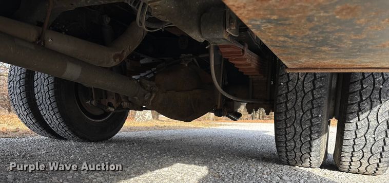 image for item FG0023 2013 RAM 3500 Crew Cab flatbed pickup truck