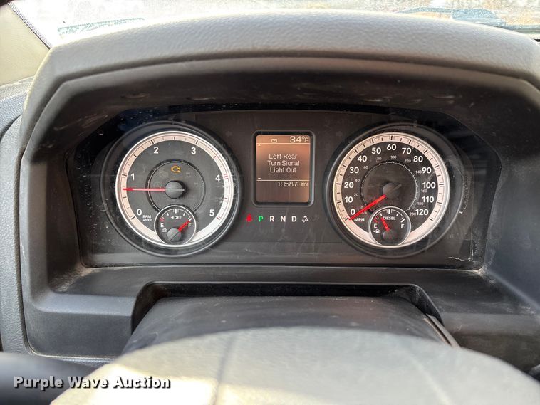 image for item FG0023 2013 RAM 3500 Crew Cab flatbed pickup truck