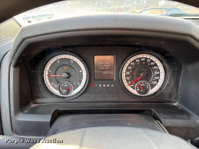 image for item FG0023 2013 RAM 3500 Crew Cab flatbed pickup truck