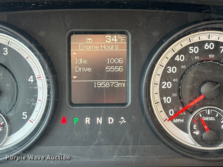 image for item FG0023 2013 RAM 3500 Crew Cab flatbed pickup truck