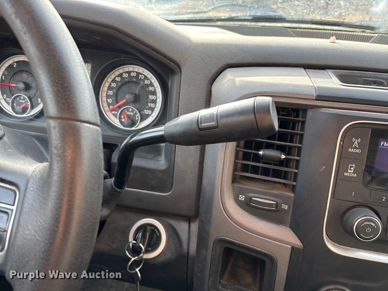 image for item FG0023 2013 RAM 3500 Crew Cab flatbed pickup truck