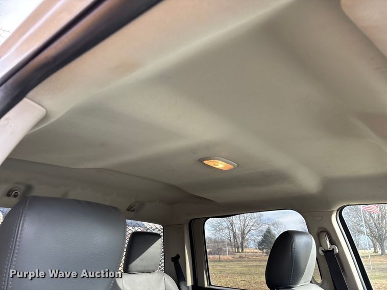 image for item FG0023 2013 RAM 3500 Crew Cab flatbed pickup truck