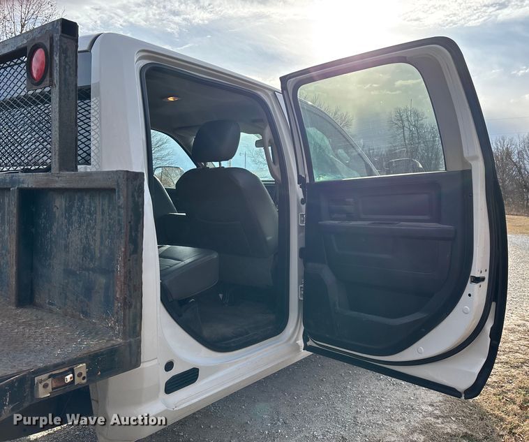 image for item FG0023 2013 RAM 3500 Crew Cab flatbed pickup truck