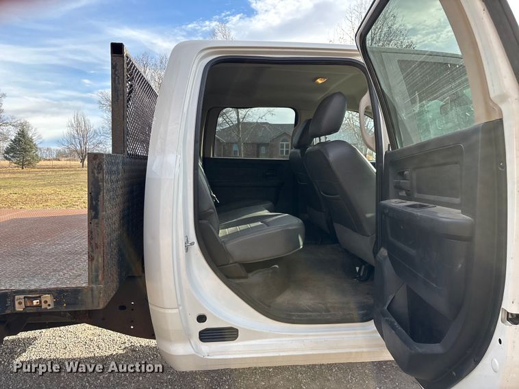 image for item FG0023 2013 RAM 3500 Crew Cab flatbed pickup truck