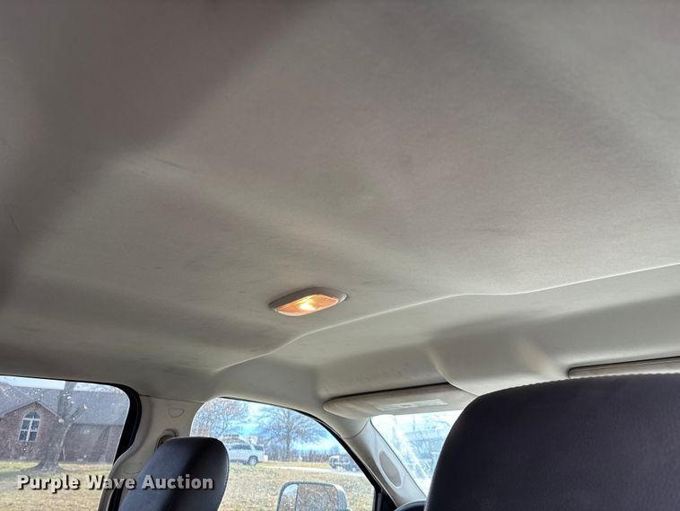 image for item FG0023 2013 RAM 3500 Crew Cab flatbed pickup truck