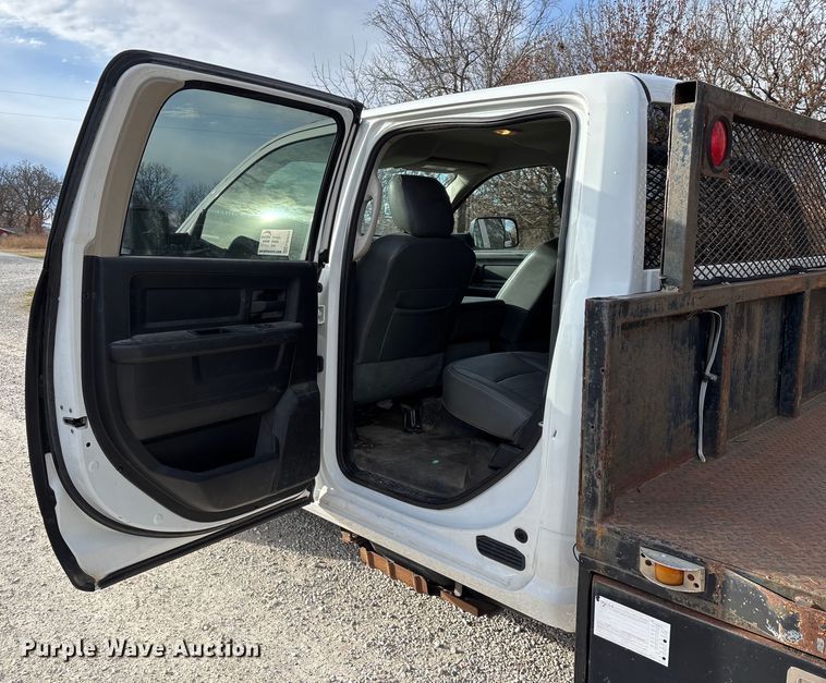 image for item FG0023 2013 RAM 3500 Crew Cab flatbed pickup truck