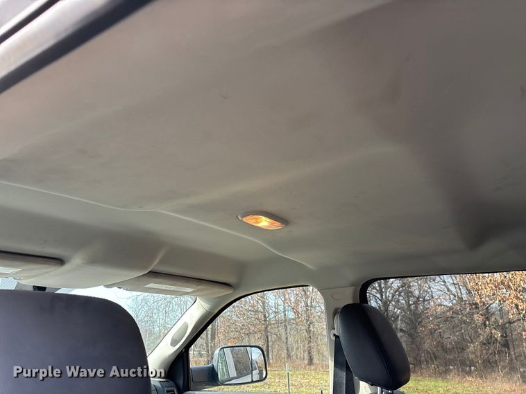 image for item FG0023 2013 RAM 3500 Crew Cab flatbed pickup truck