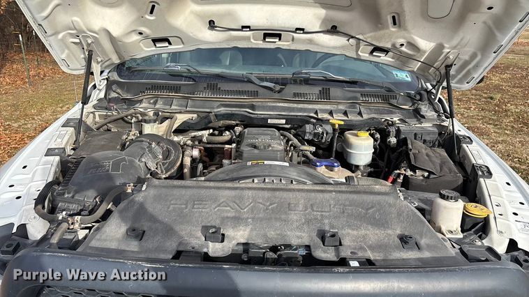 image for item FG0023 2013 RAM 3500 Crew Cab flatbed pickup truck