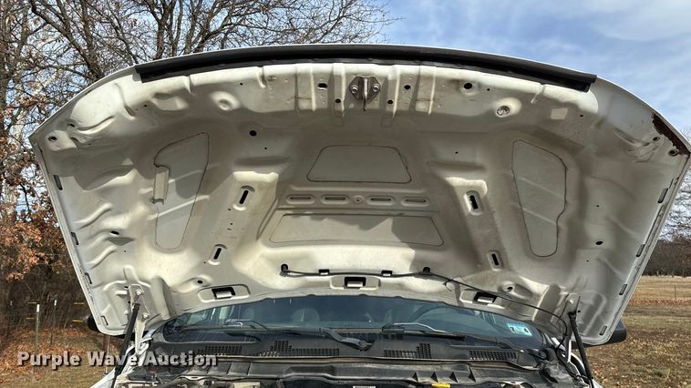 image for item FG0023 2013 RAM 3500 Crew Cab flatbed pickup truck