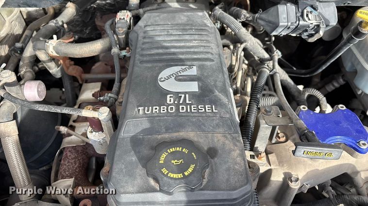 image for item FG0023 2013 RAM 3500 Crew Cab flatbed pickup truck