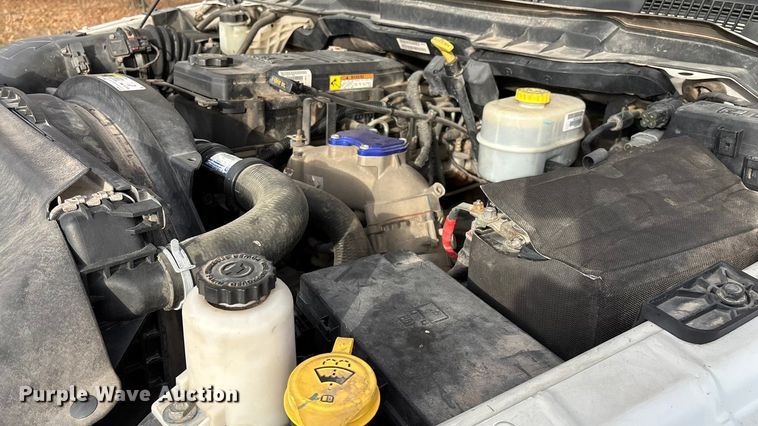 image for item FG0023 2013 RAM 3500 Crew Cab flatbed pickup truck