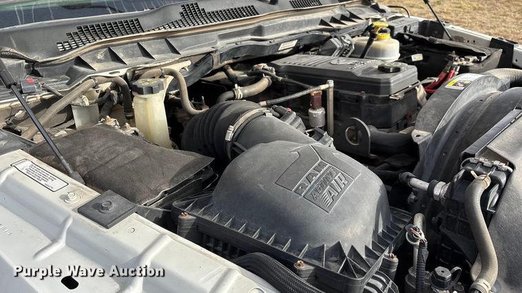 image for item FG0023 2013 RAM 3500 Crew Cab flatbed pickup truck