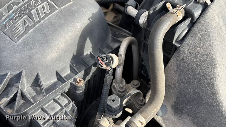 image for item FG0023 2013 RAM 3500 Crew Cab flatbed pickup truck