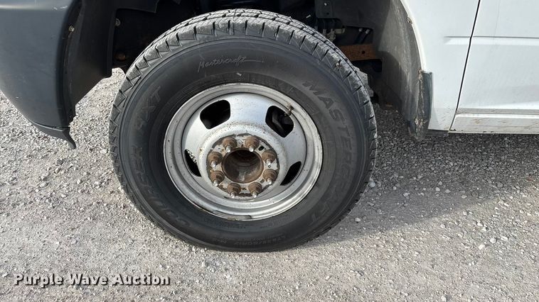 image for item FG0023 2013 RAM 3500 Crew Cab flatbed pickup truck