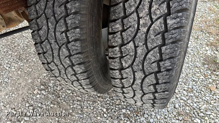 image for item FG0023 2013 RAM 3500 Crew Cab flatbed pickup truck