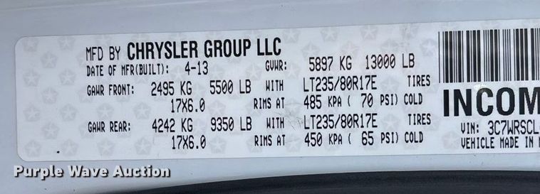 image for item FG0023 2013 RAM 3500 Crew Cab flatbed pickup truck