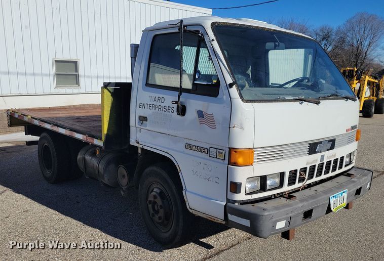 image for item NO9879 1986 Chevrolet 40 Tiltmaster dump flatbed truck