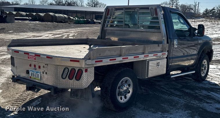 image for item OE9501 2005 Ford F250 XLT Super Duty flatbed pickup truck