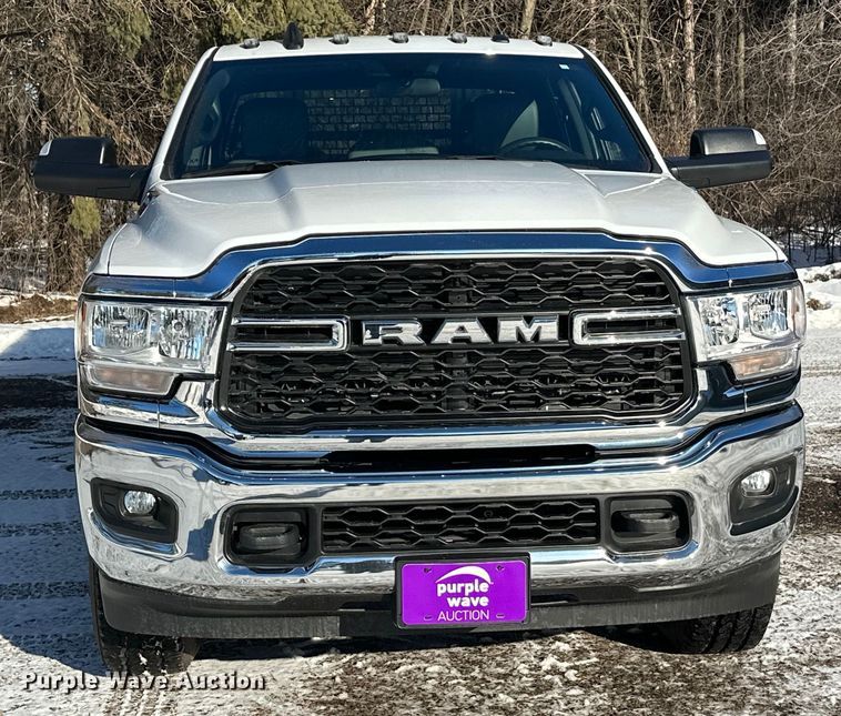 image for item DW4419 2022 RAM 3500 Crew Cab flatbed pickup truck