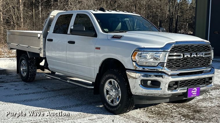 image for item DW4419 2022 RAM 3500 Crew Cab flatbed pickup truck