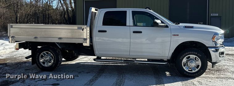 image for item DW4419 2022 RAM 3500 Crew Cab flatbed pickup truck